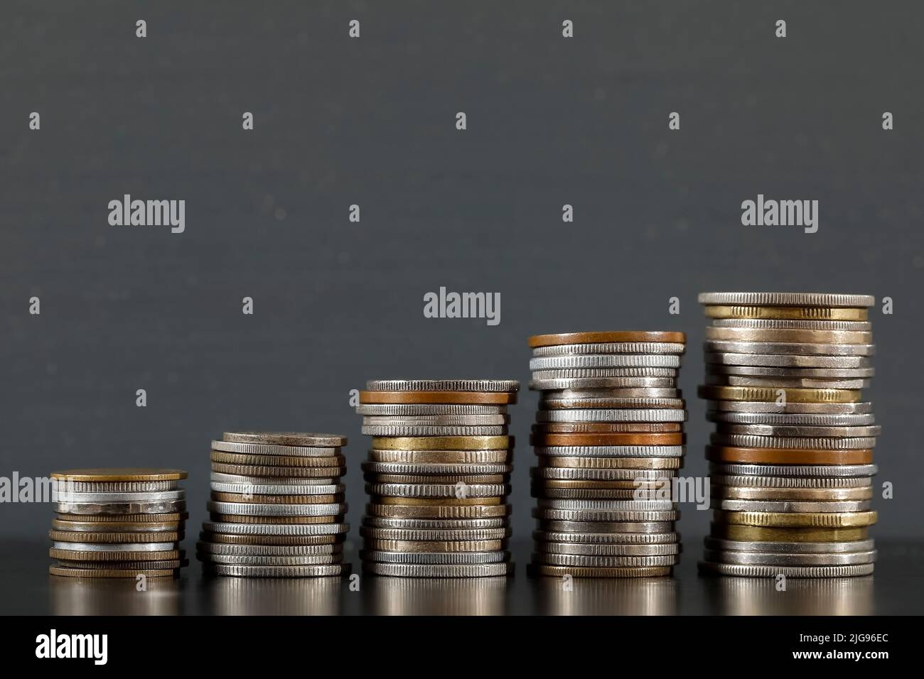 The image of money, in this case coins, express economic growth. Stock Photo