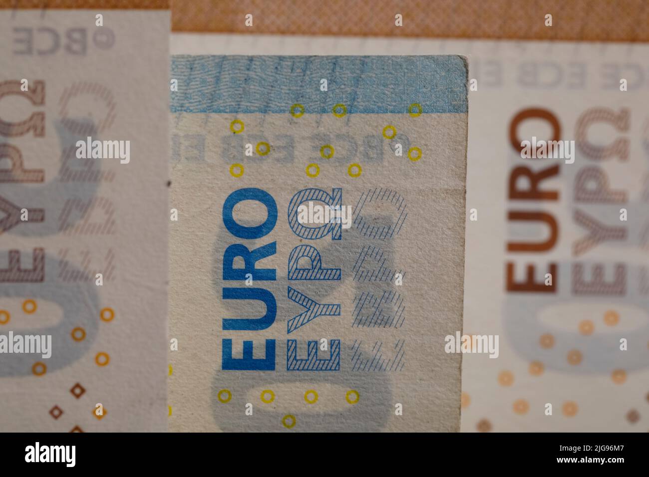 A few notes of Euro currency. The currency of the euro area have been in circulation since 2002 and Euro banknotes are not made of paper, but of pure Stock Photo