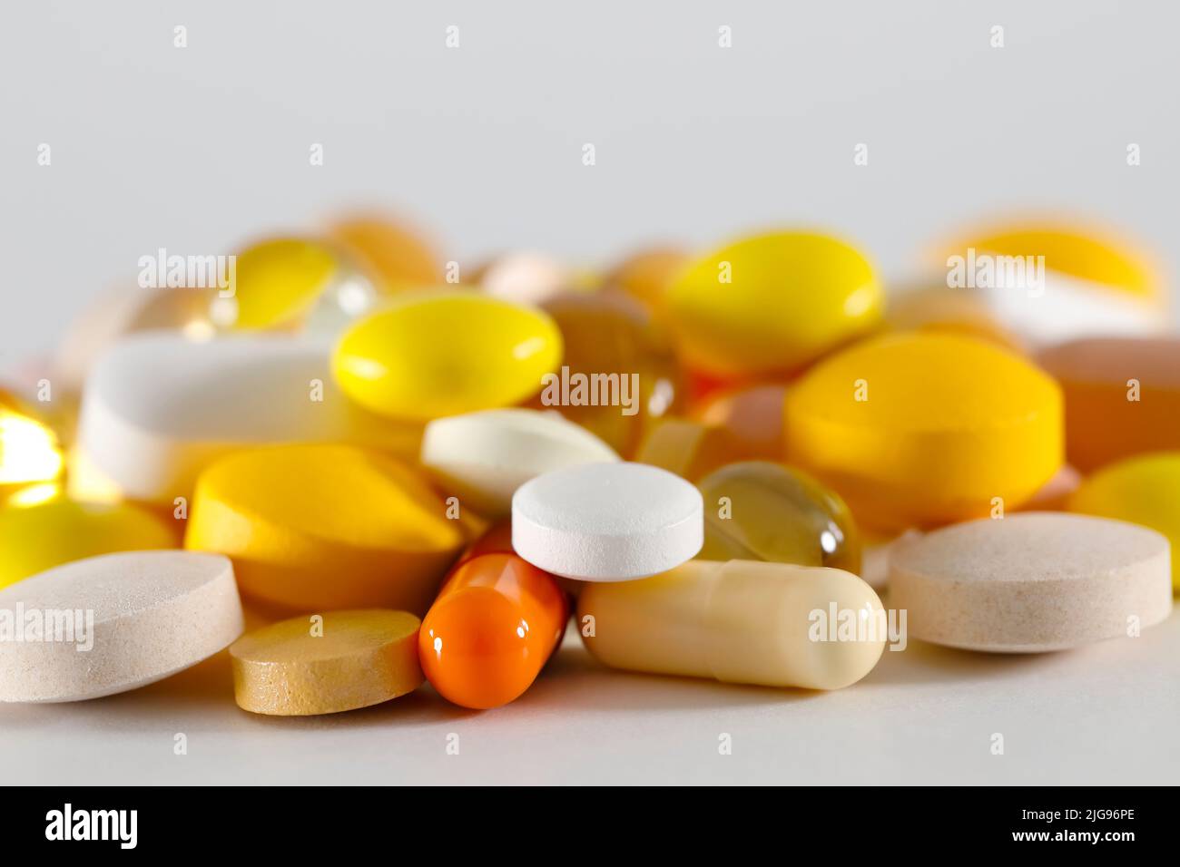 Here is a large dosage of medicines. These varied tablets have various shapes and various colors. Stock Photo