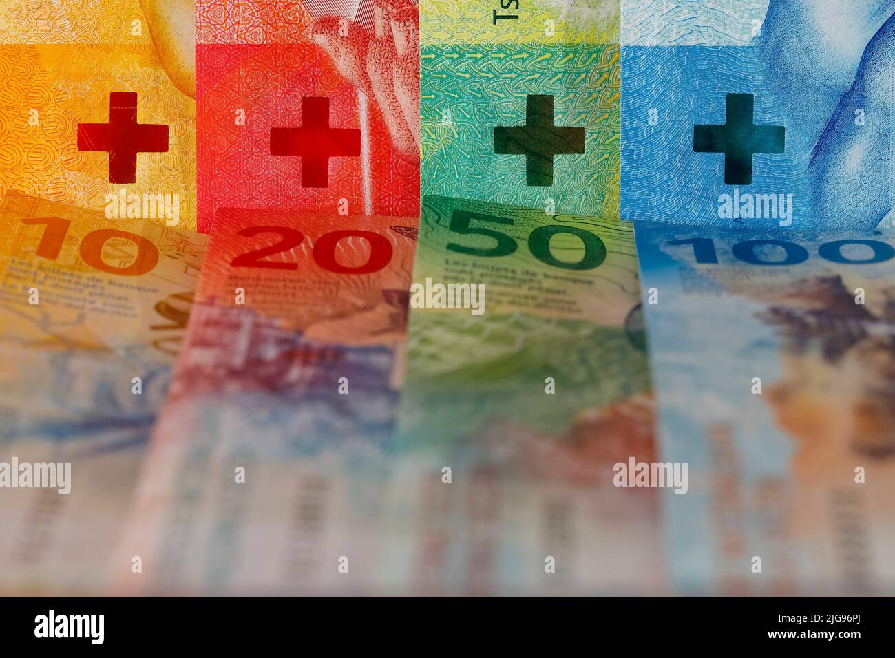 New Swiss banknotes of various denominations. These new banknotes are the eighth series of banknotes which were introduced between 2016 and 2019. Stock Photo