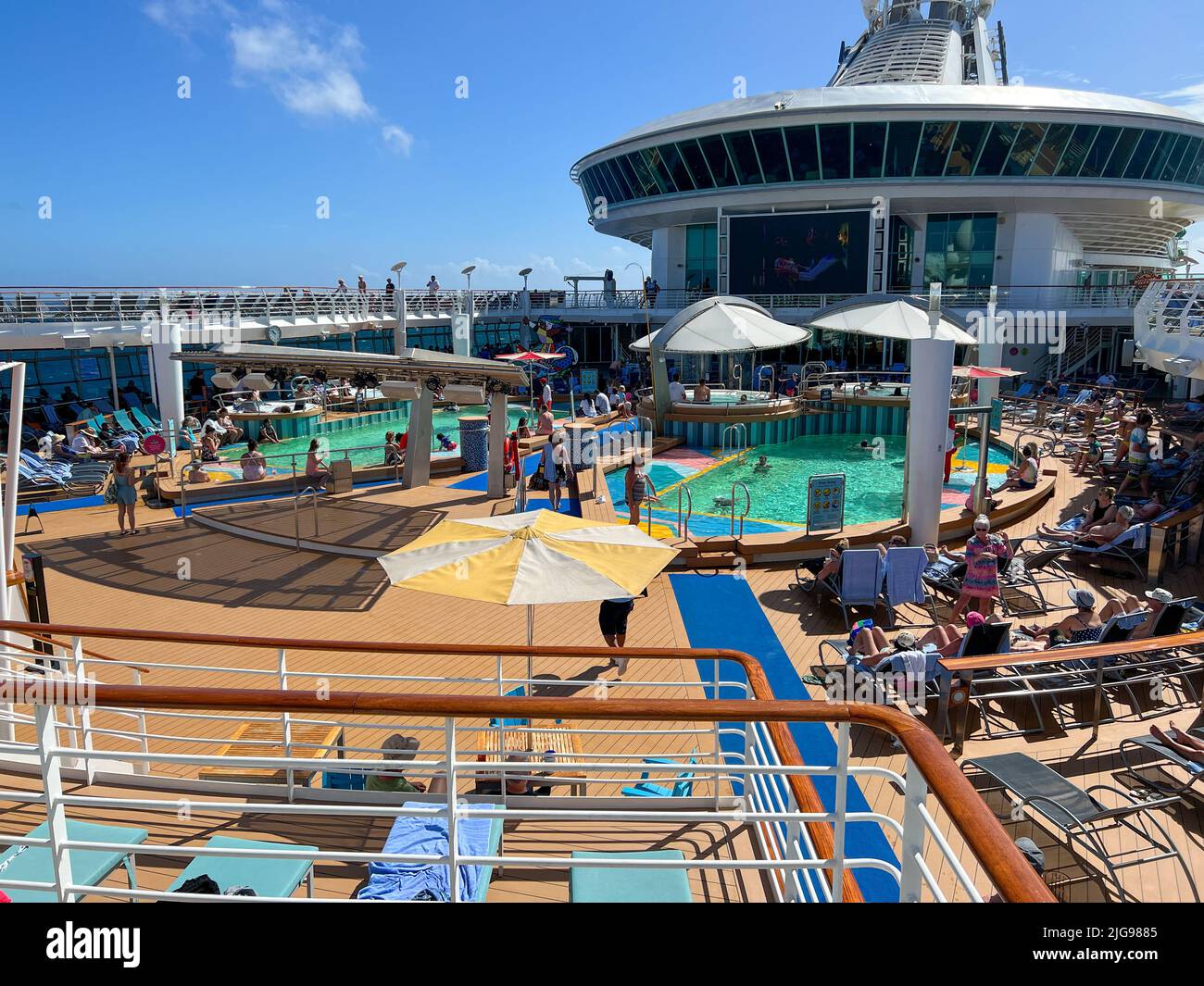 Orlando, FL USA - February 12, 2022:  The Swimming pool area aboard the Royal Caribbean Mariner of the Seas Cruise Ship. Stock Photo