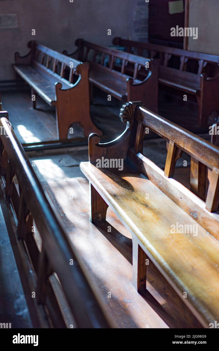 Wooden pew in an English church Stock Photo