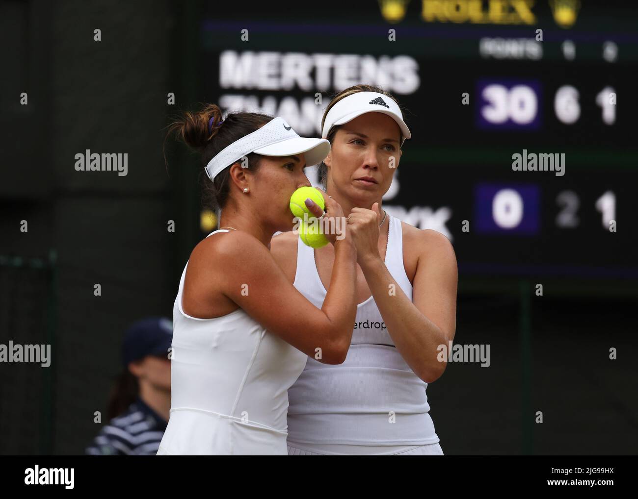 8th July 2022, All England Lawn Tennis and Croquet Club, London, England; Wimbledon Tennis tournament; Desirae Krawczyk (USA) talking tactics with doubles partner Danielle Collins (USA) in the womens doubles semi-final Stock Photo