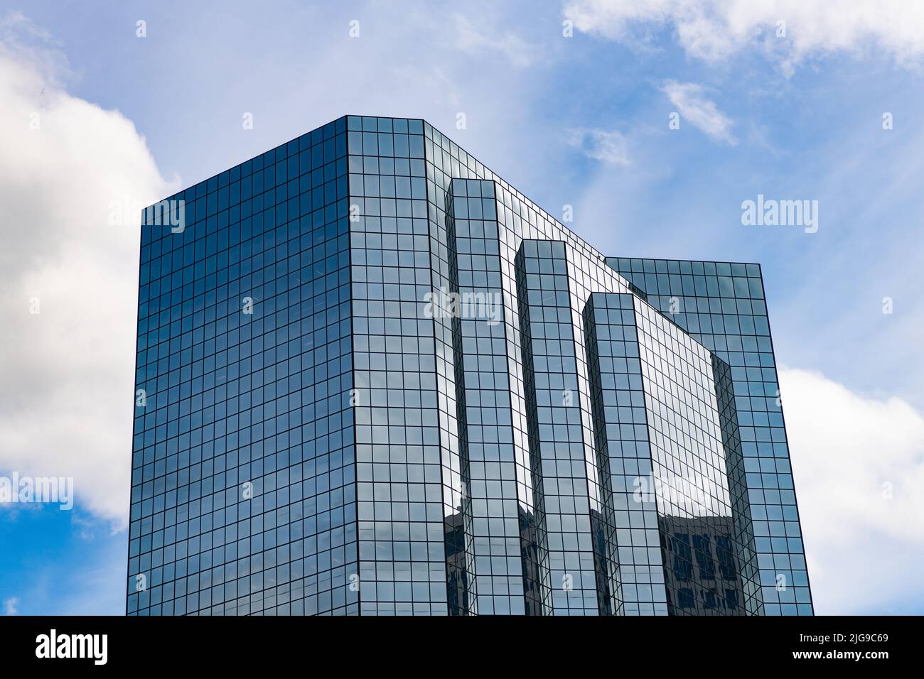 modern glassy skyscraper buildings. business center in modern city ...