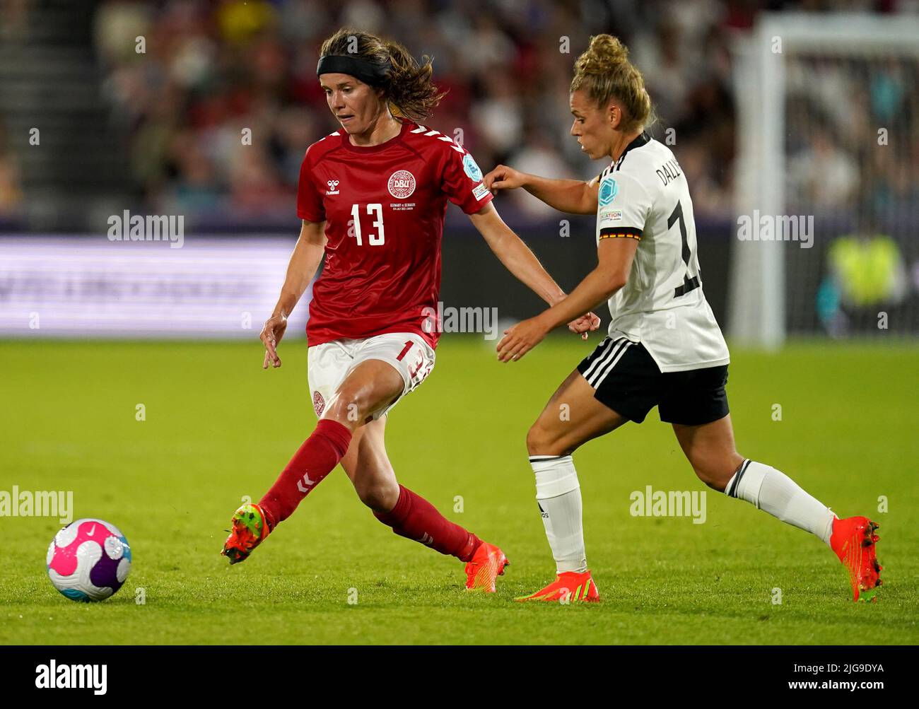 Denmark’s Sofie Pedersen in action Germany’s Linda Dallmann during the UEFA Women's Euro 2022 Group B match at Brentford Community Stadium, London. Picture date: Friday July 8, 2022. Stock Photo