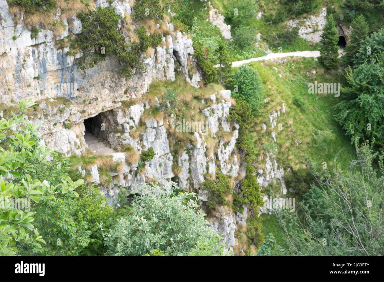 The road of the 52 tunnels is a military mule track built during the First World War on the Pasubio massif in Italy Stock Photo