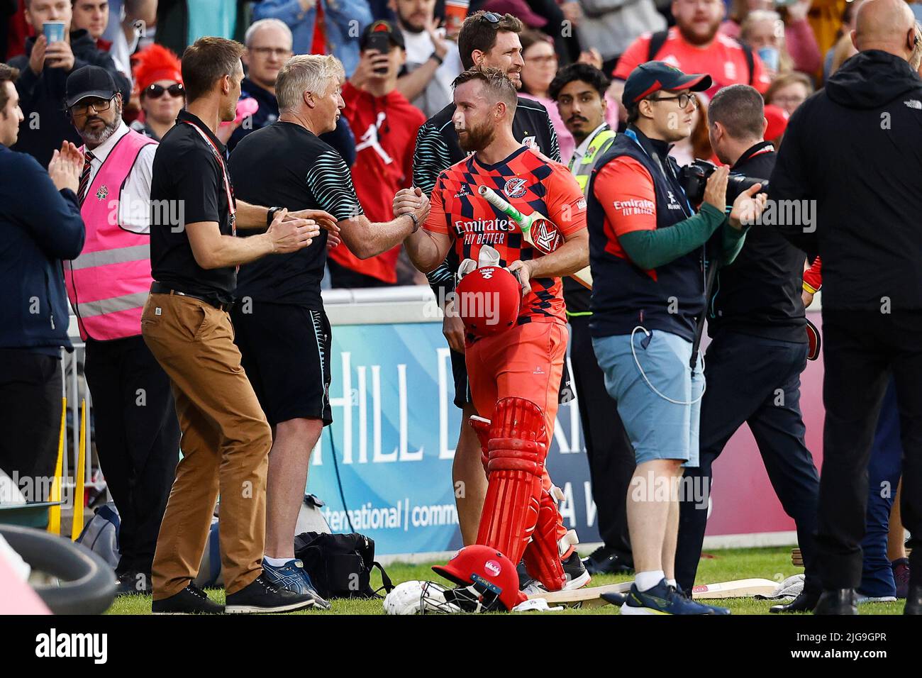 8th July 2022, Old Trafford, Manchester, England: Vitality Blast T20 cricket, Lancashire versus Essex: Lancashire Lightning man of the match Steven Croft is congratulated by management team Glen Chapple and Mark Chilton after he steered the home side to victory by seven wickets Credit: Action Plus Sports Images/Alamy Live News Stock Photo