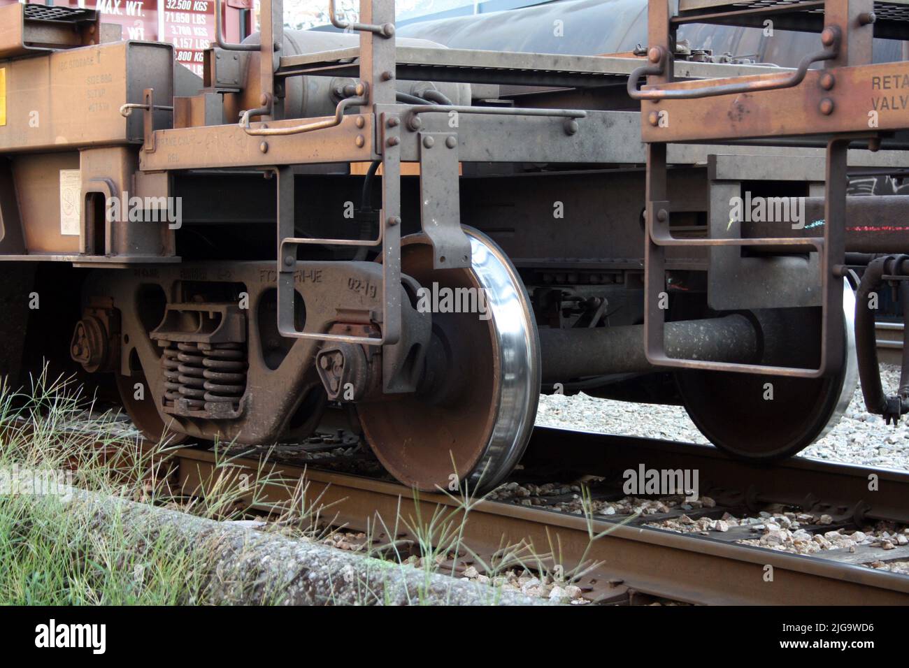 a closeup shot of rails and metal wheels in East Vancouver, British Columbia, Canada Stock Photo