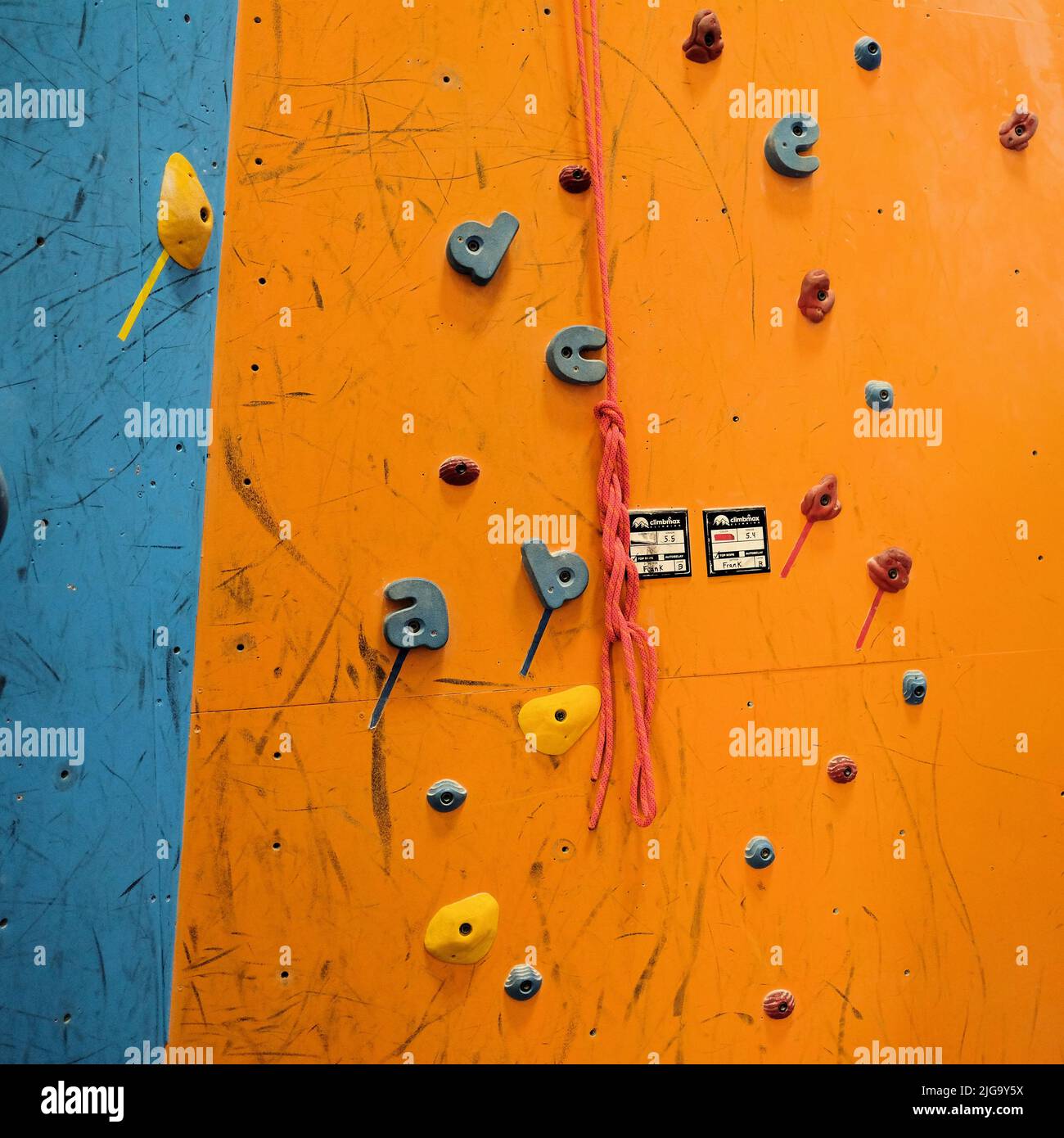 Lettershaped climbing holds on a wall for teaching young children