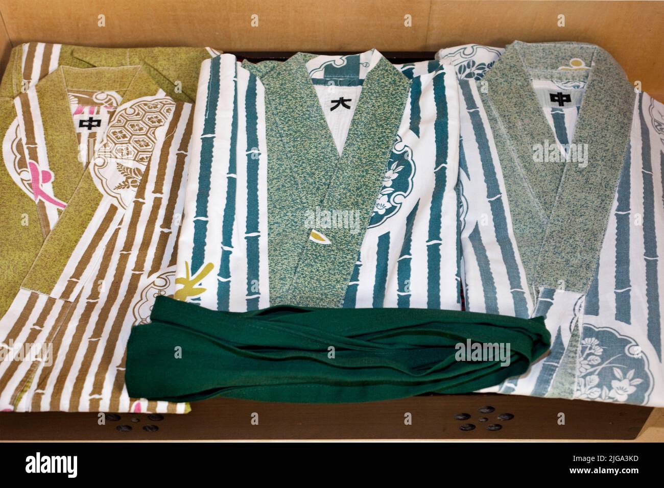Beautiful Japanese cotton yukata robes folded at a traditional onsen in