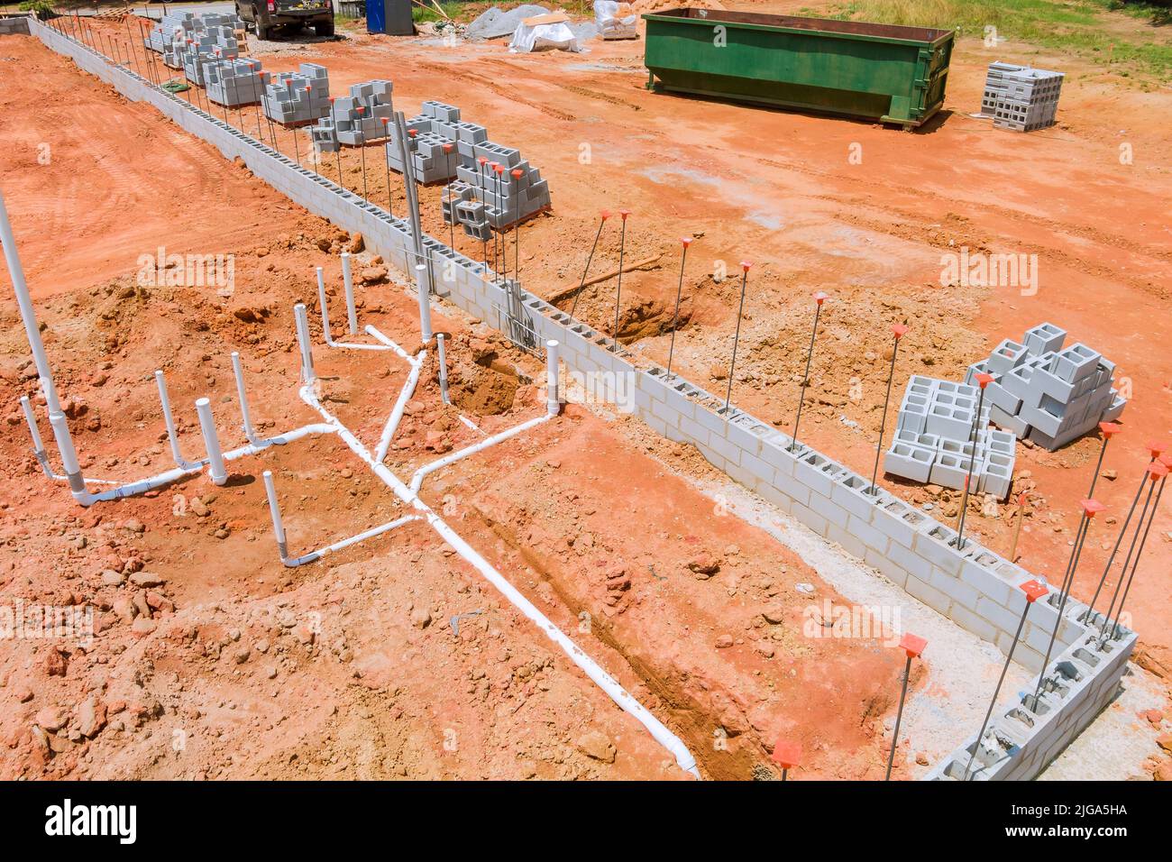 Laying sewer and water pipes under the foundation of a new residential