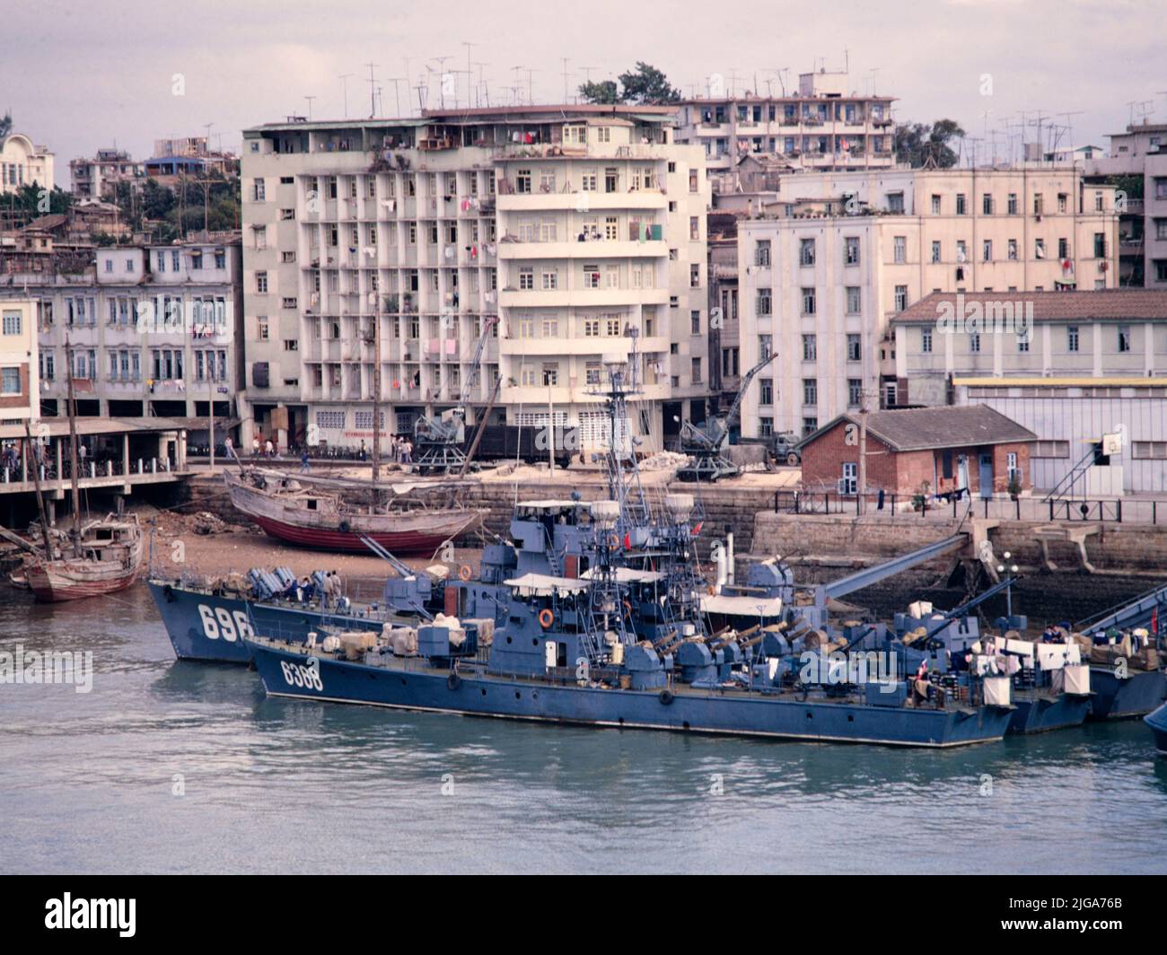 Gulangyu Island, Xiamen, (Amoy), Fujian Province, eastern China November 1986, Chinese Navy gunboats tied up at the pier. Stock Photo