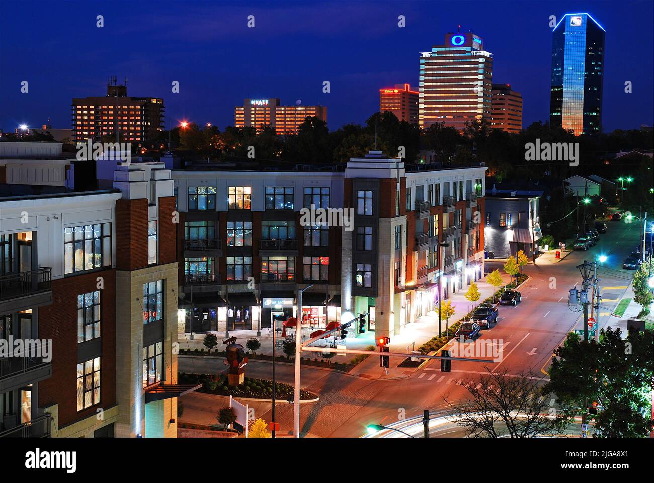 The sunset sky is reflected in the glass skyscrapers of the downtown Lexington, Kentucky skyline