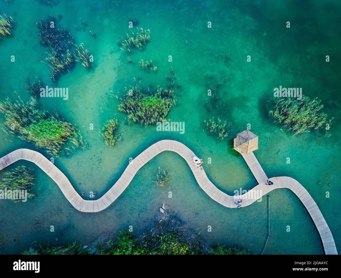 Turquiose Water and Wooden Bridge. Aerial Landscape. Park Grodek in Jaworzno, Poland. Polish Maldives. - Stock Image