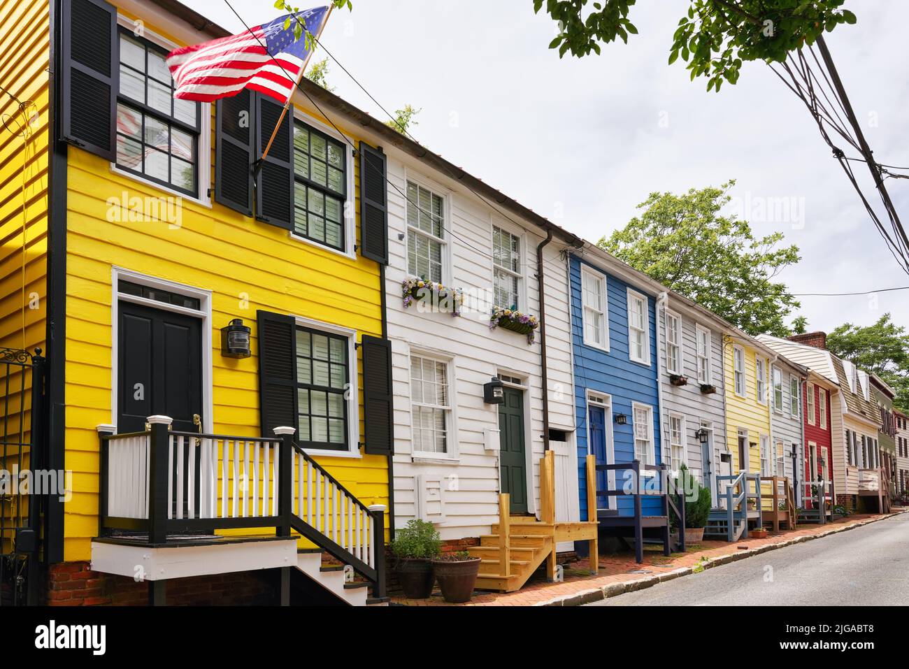 Colorful wooden townhouses in historic downtown Annapolis, Maryland, USA. Typical picturesque architecture in the capital city of Maryland. Stock Photo