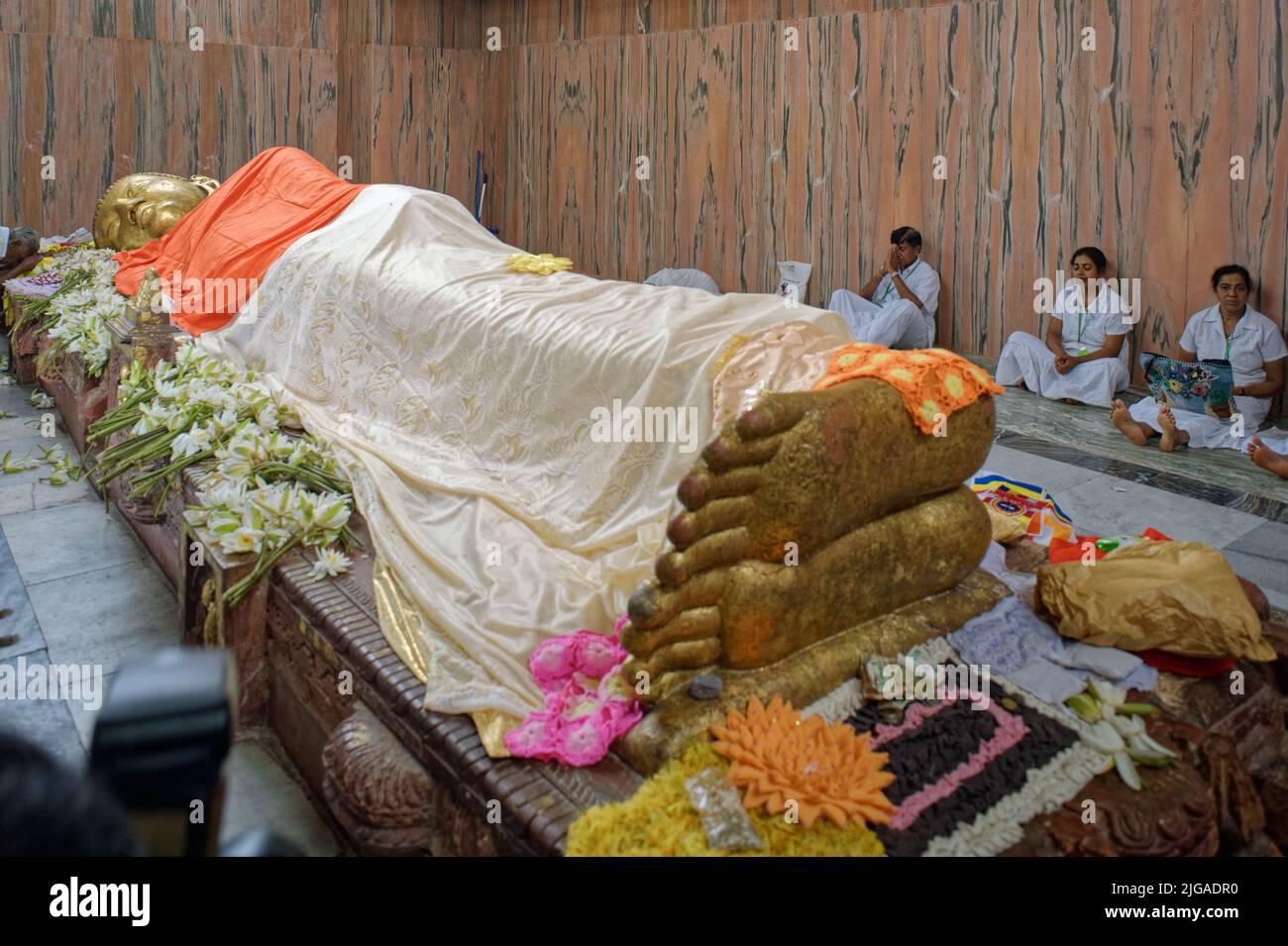 08 28 2008 Golden Buddha's foot at the temple Mahaparinirvana Kusinara or Kushinagar, Uttar Pradesh, India Stock Photo
