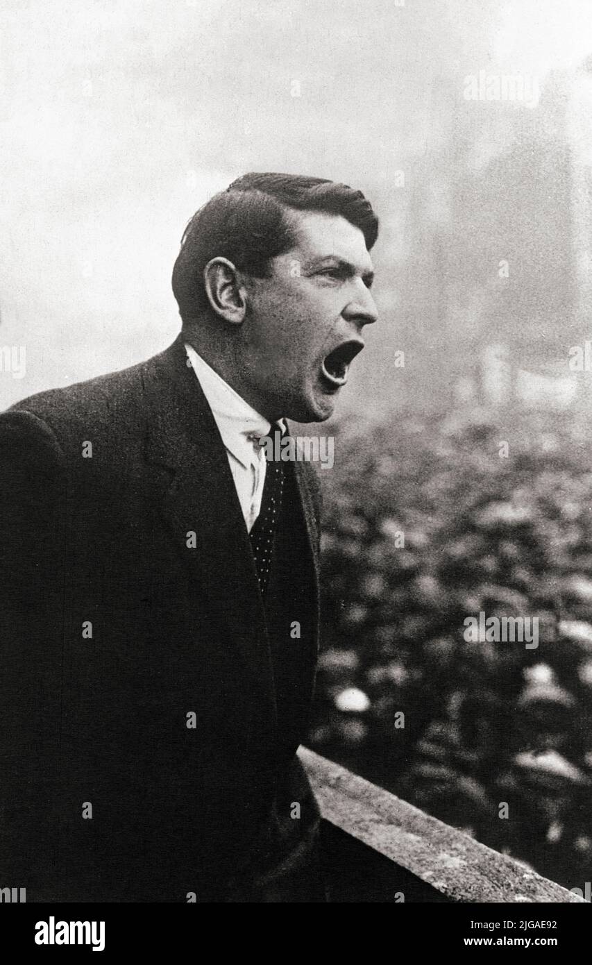 Michael Collins (1890-1922) an Irish revolutionary, soldier and politician making a political speech. He was a leading figure in the early-20th century struggle for Irish independence who travelled to the London peace conference to negotiate a treaty.  The negotiations ultimately resulted in the Anglo-Irish Treaty which was signed on 6 December 1921.  He was Chairman of the Provisional Government of the Irish Free State from January 1922 and commander-in-chief of the National Army from July until his death in an ambush in August 1922, during the Civil War that resulted from the treaty. Stock Photo
