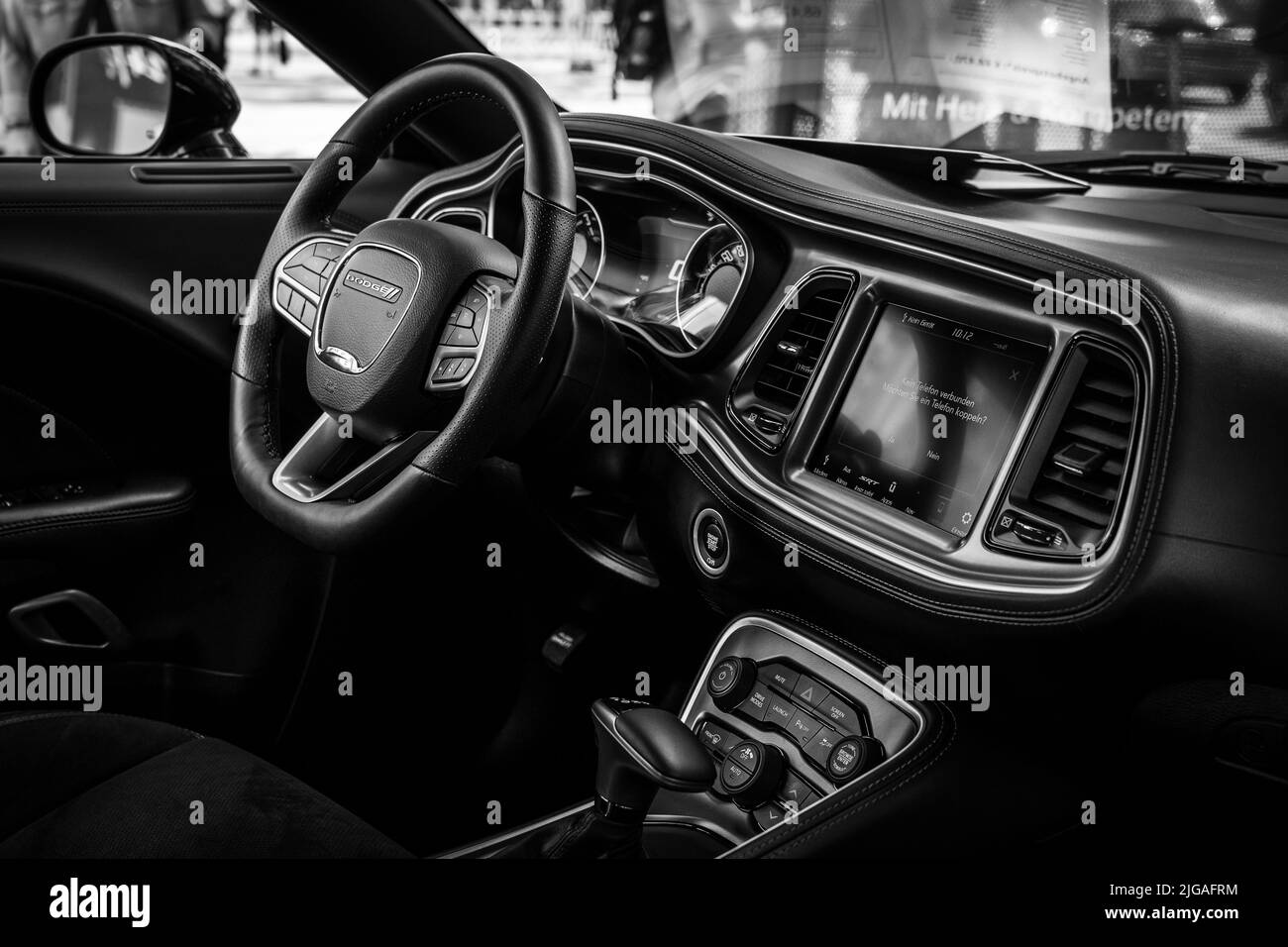 BERLIN - JUNE 18, 2022: Interior of the muscle car Dodge Challenger R/T. Black and white. Classic Days Berlin. Stock Photo