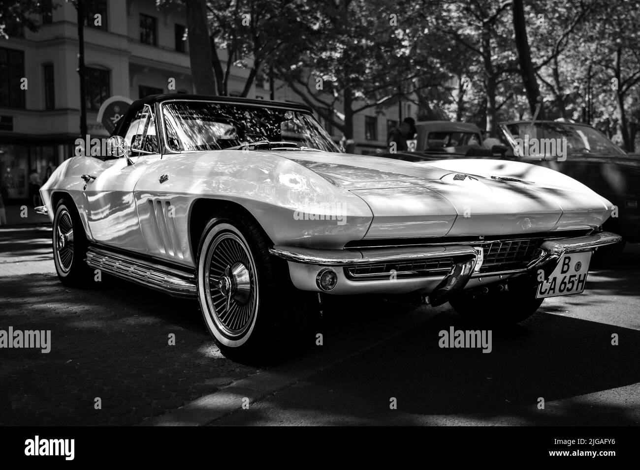 BERLIN - JUNE 18, 2022: Sports car Chevrolet Corvette Sting Ray Convertible (C2), 1965. Black and white. Classic Days Berlin. Stock Photo
