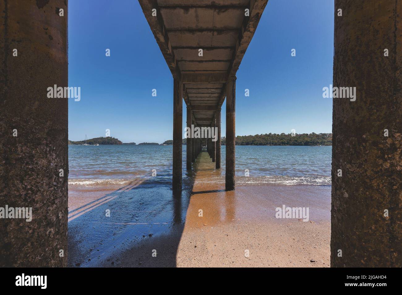 A scenic view of the bottom of a dock at Boca Chica, Chiriqui Province, Panama Stock Photo