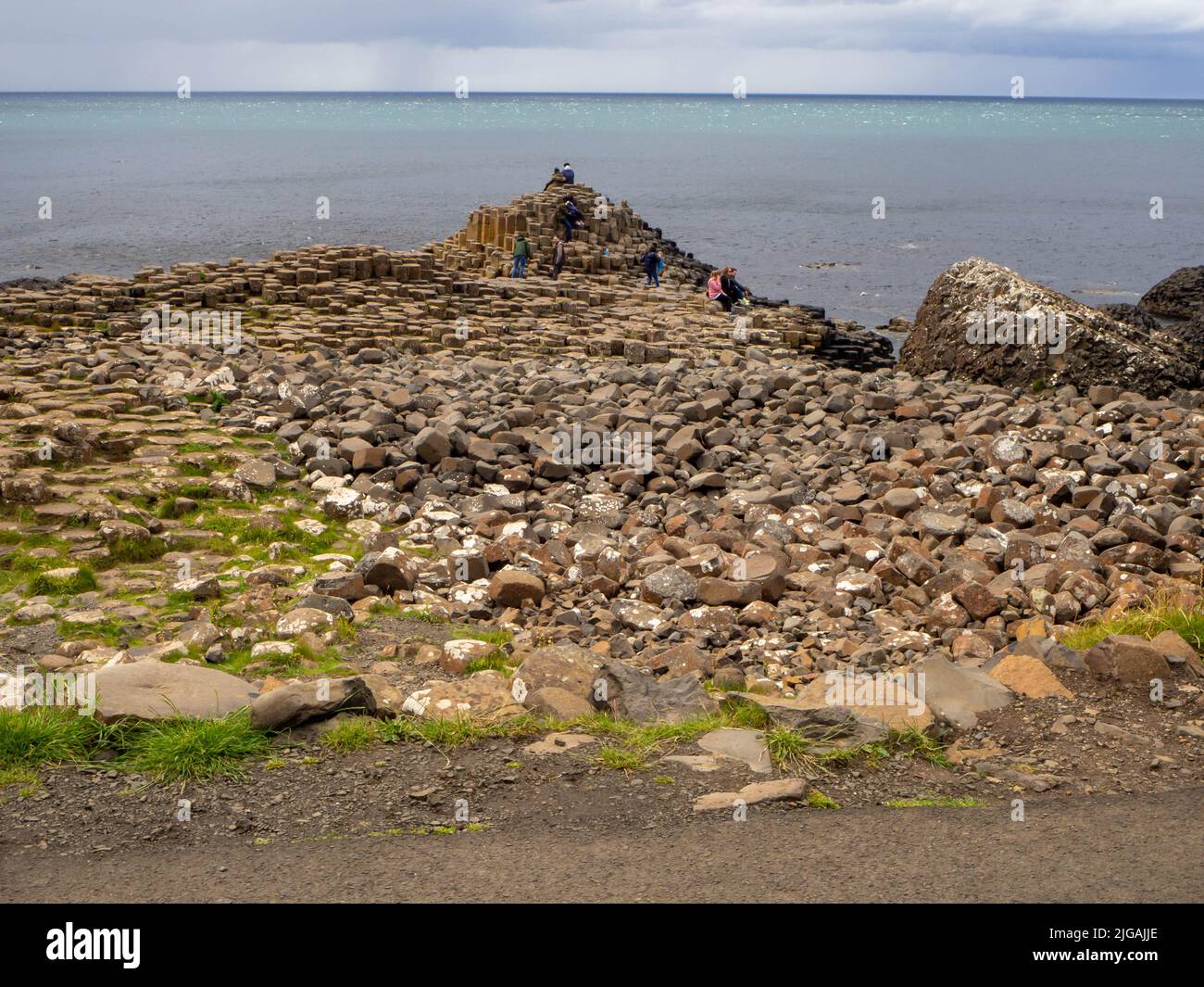 Giants Causeway rocky outcrop reaching out to the North Atlantic Ocean Stock Photo