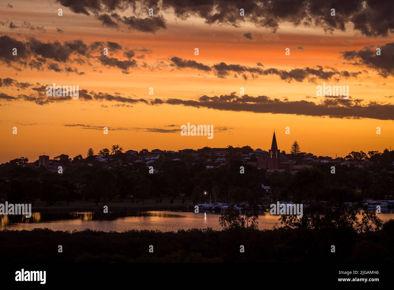 Golden sky after the sun has set overlooking Leschenault Inlet, Bunbury, Western Australia Stock Photo