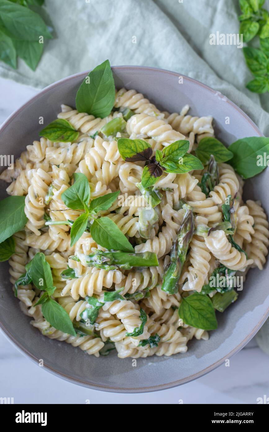 spring pasta with asparagus and wild garlic Stock Photo