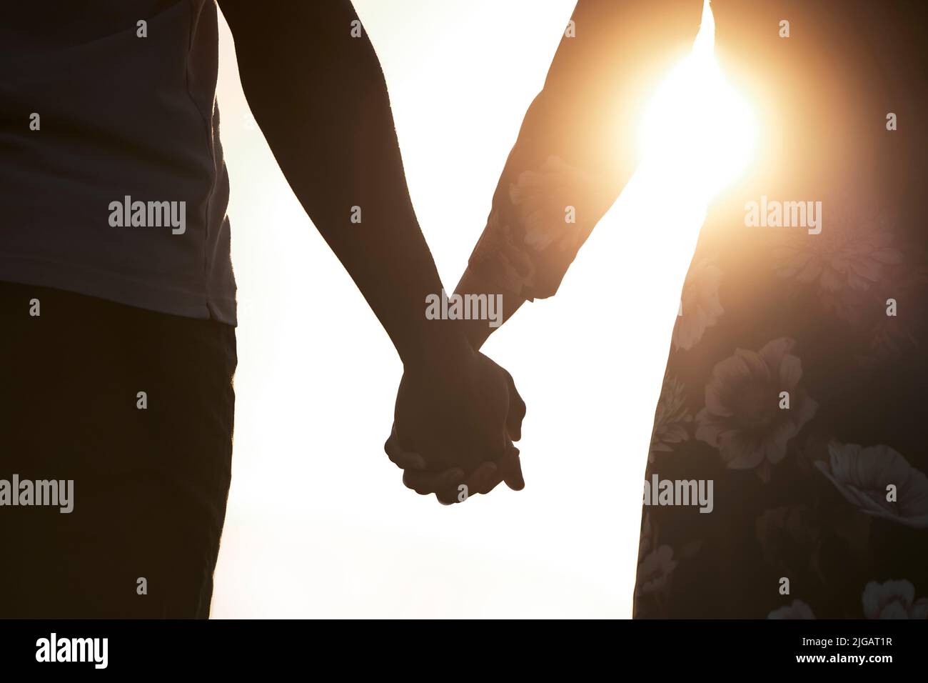 Hands touching silhouette hi-res stock photography and images - Alamy