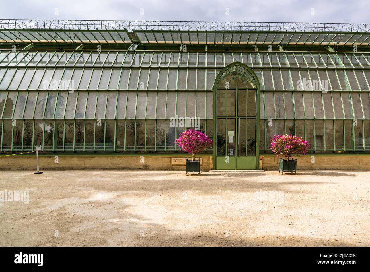 Leaning greenhouse in the botanical garden of Montpellier, France Stock Photo