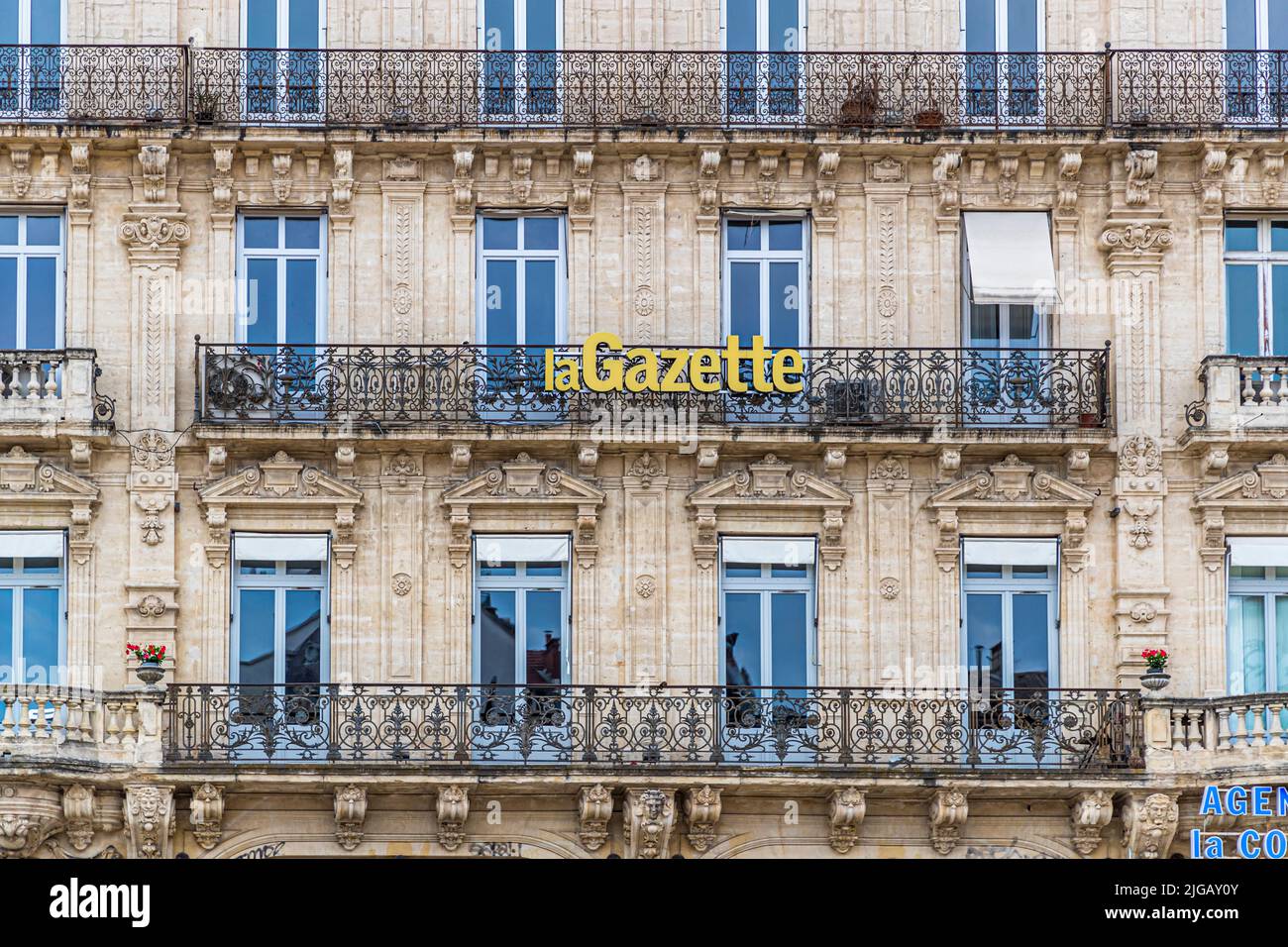 Weaving panel 'La Gazette' on a facade in Montpellier, France Stock Photo