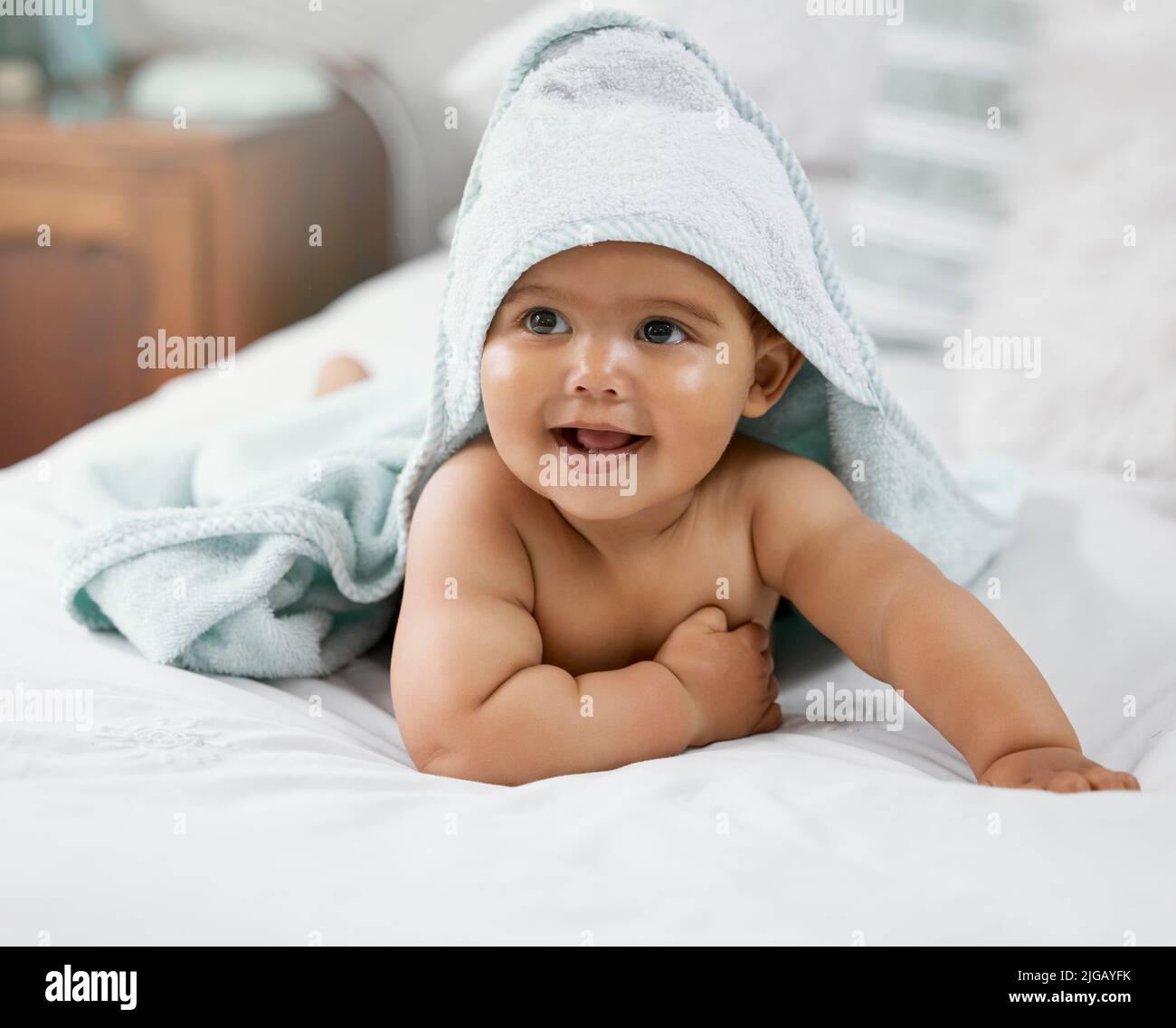 Does this outfit look cute on me. an adorable baby boy wrapped in a