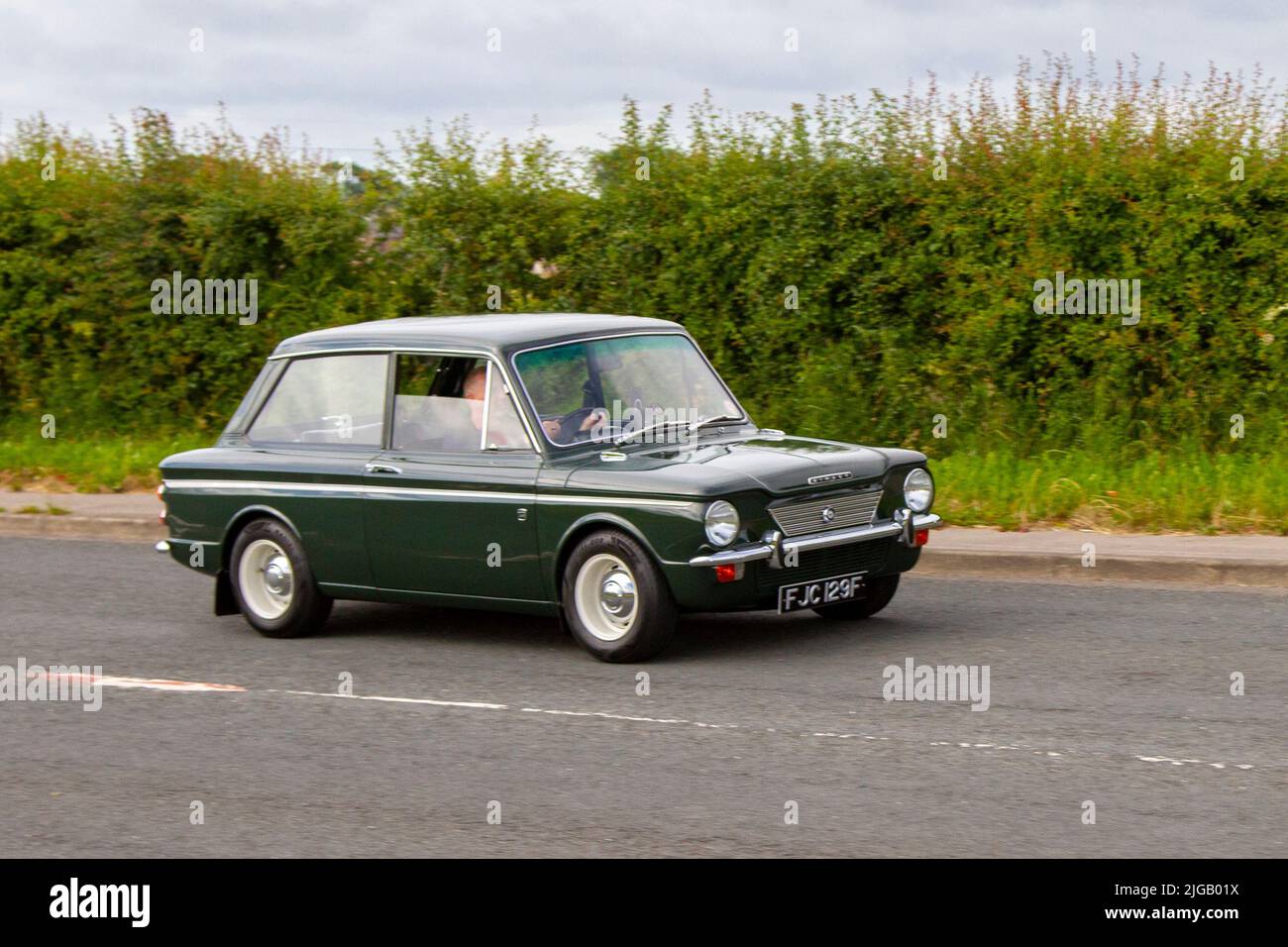 1968 60s green sixties Singer Chamois IMP Sport 875cc petrol; en-route to Hoghton Tower for the Supercar Summer Showtime car meet which is organised by Great British Motor Shows in Preston, UK Stock Photo