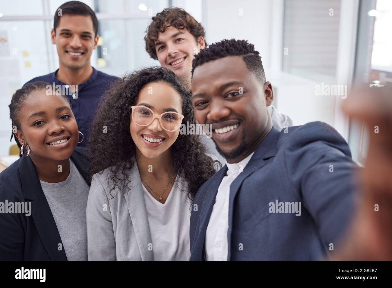 Diverse group capturing moment hi-res stock photography and images - Alamy