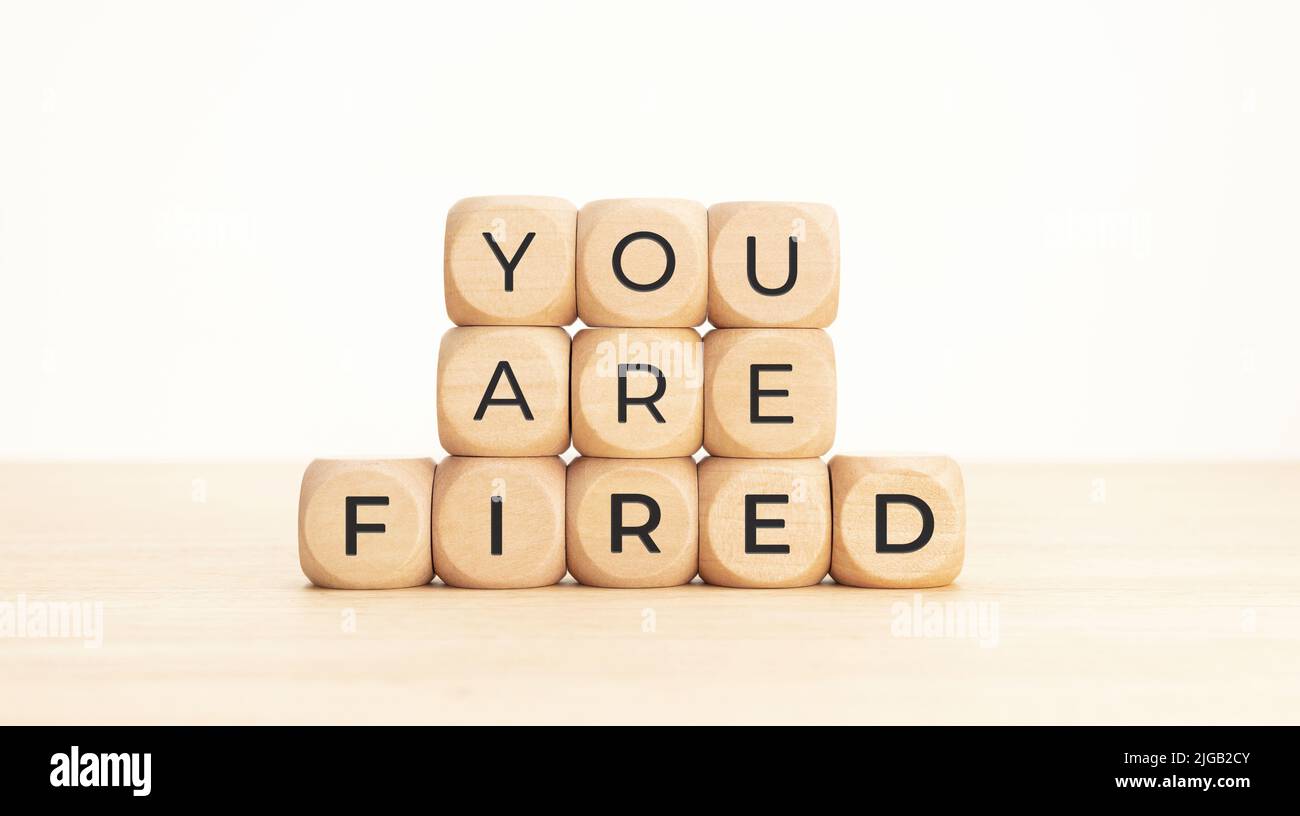 You are Fired phrase on wooden blocks. Unemployed concept Stock Photo