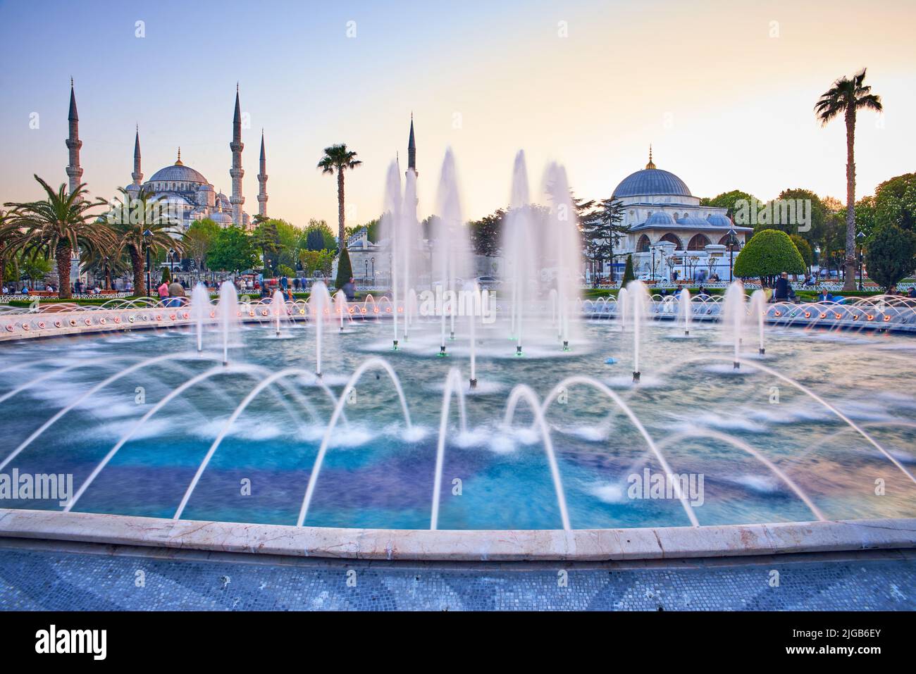 Fountain and The Sultan Ahmed Mosque in Istanbul during sunset Stock ...