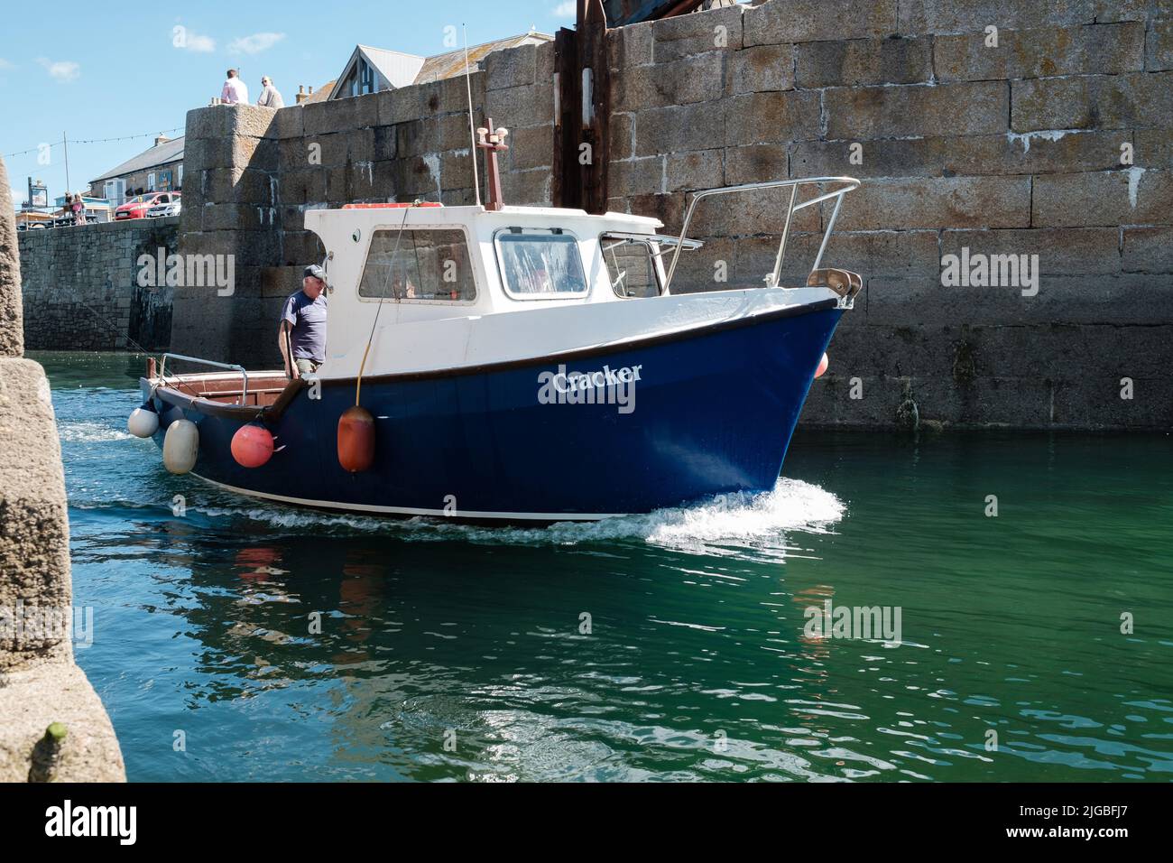Boats leaving Porthleven Harbour, Cornwall Stock Photo Alamy