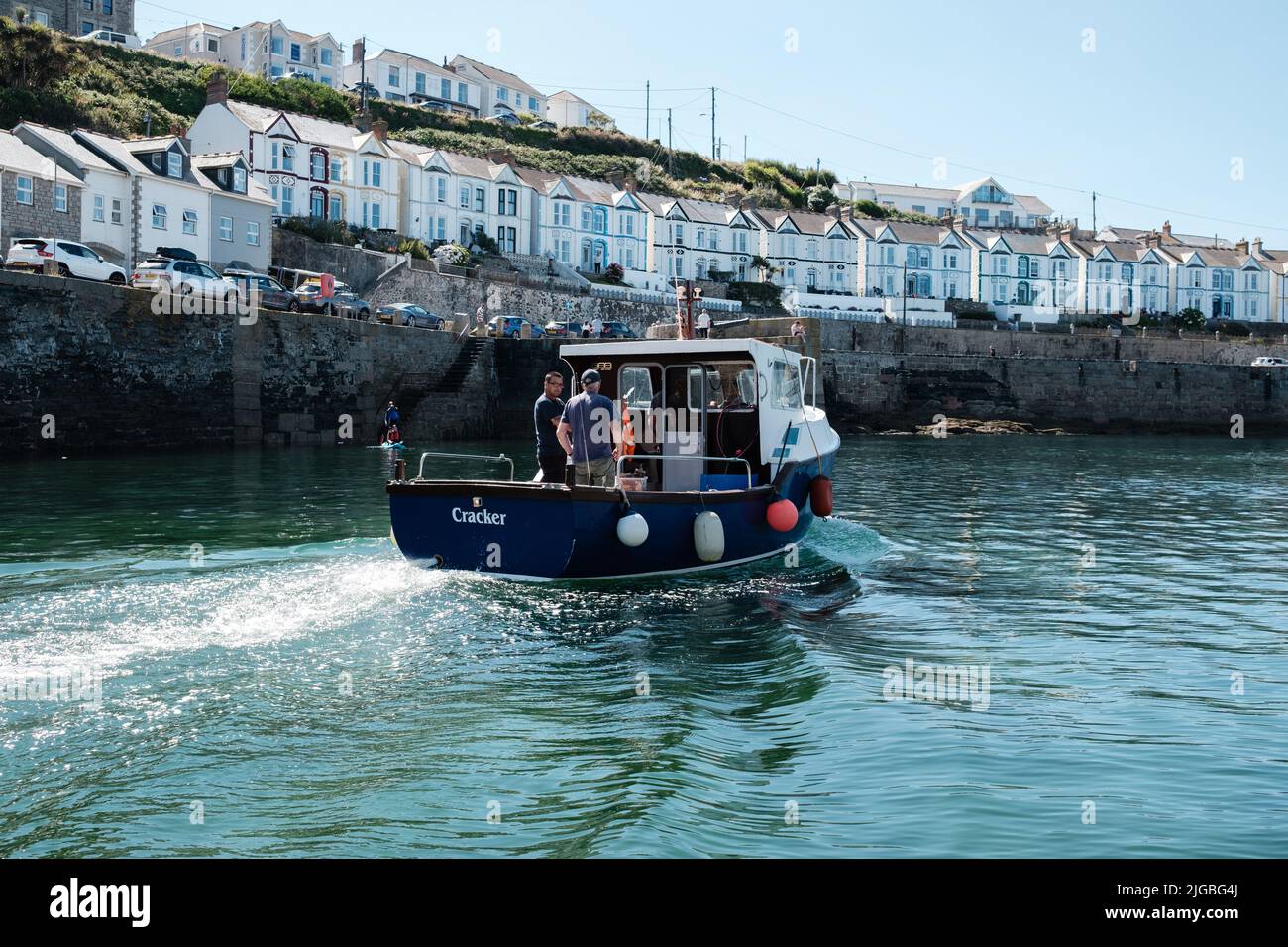 Boats leaving Porthleven Harbour, Cornwall Stock Photo Alamy