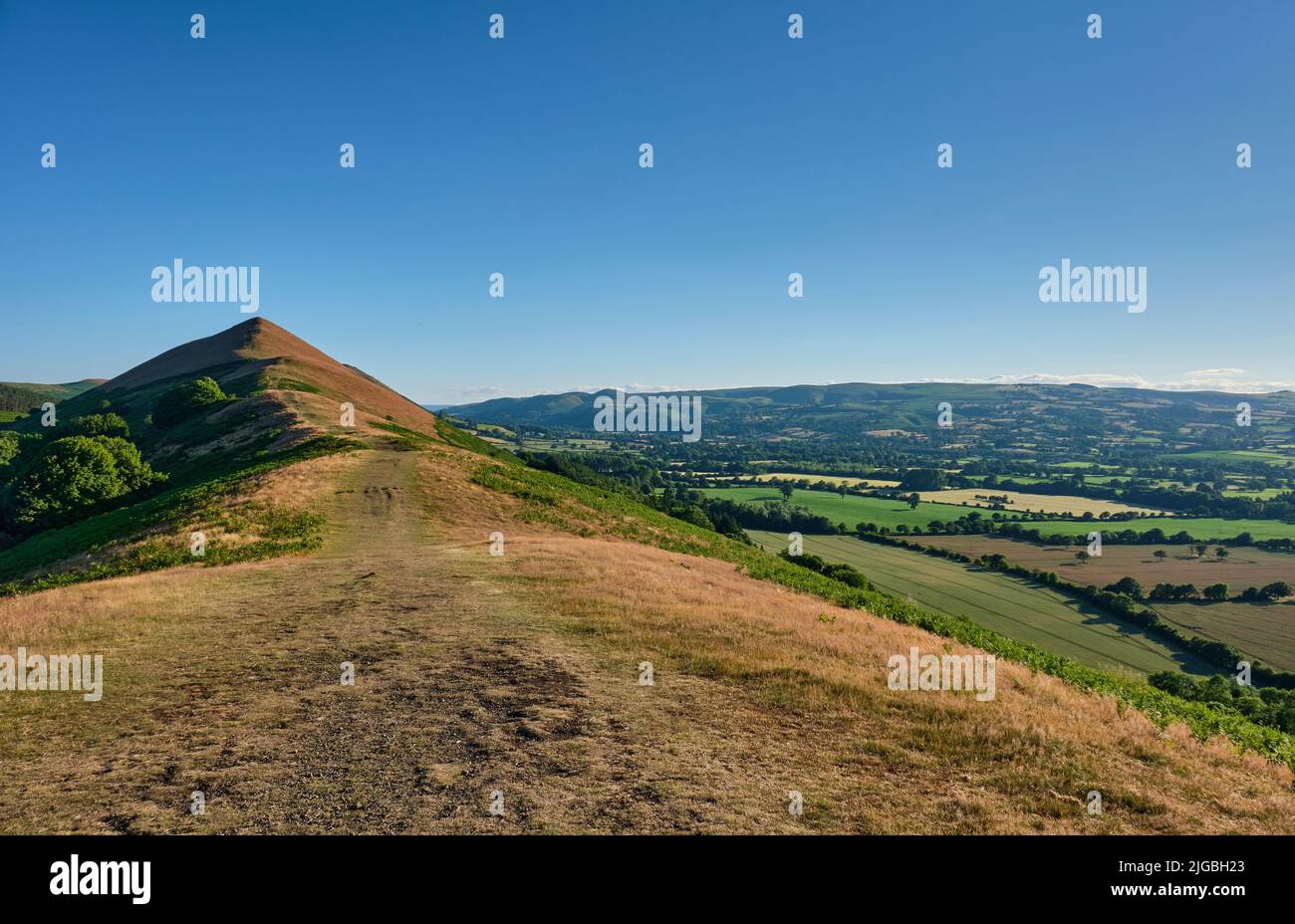 The Lawley with The Long Mynd in the background, near Church Stretton, Shropshire Stock Photo