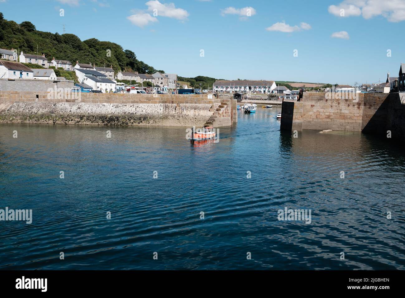 Boats leaving Porthleven Harbour, Cornwall Stock Photo Alamy