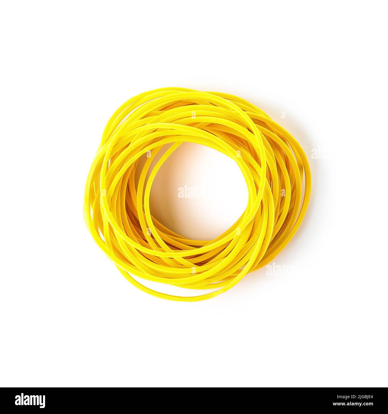 Stack of yellow rubber bands isolated on white background Stock Photo