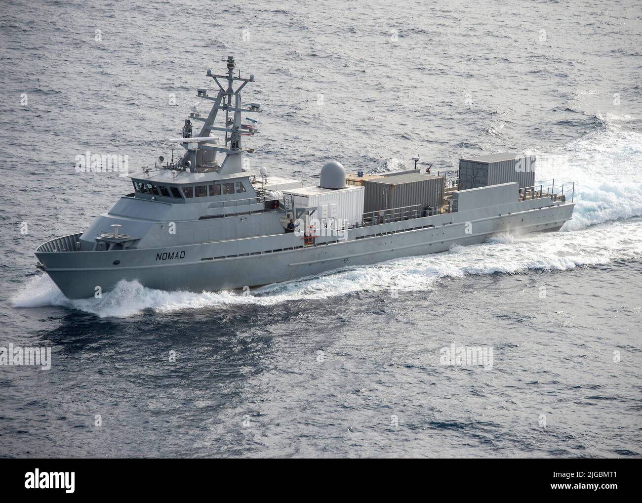 Pacific Ocean, United States. 28 June, 2022. The U.S. Navy large unmanned surface vessel USV Nomad transits the Pacific Ocean on the way to Rim of the Pacific 2022 multi-national exercises, June 28, 2022 in the Pacific Ocean. The Nomad is a completely autonomous unmanned vessel, part of the Navy Overlord program.  Credit: MC1 Tyler Fraser/Planetpix/Alamy Live News Stock Photo