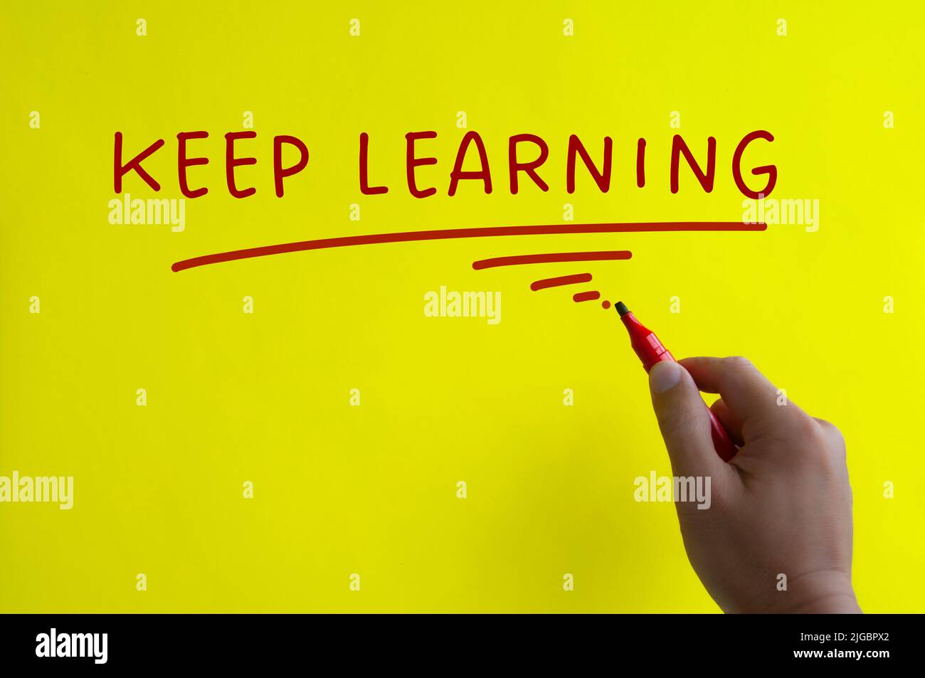Keep learning text on yellow cover background. Learning concept. Stock Photo
