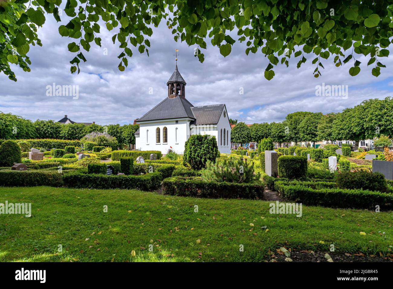 chapel in the center of the historic fishing village of Holm, Schleswig, Germany Stock Photo