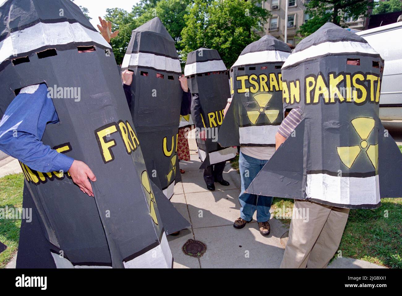 Greenpeace protestors, wearing bomb costumes, rally outside the Embassy of Pakistan, May 28, 1998 in Washington, DC. The protesters called for an end to nuclear arms race which has increased with Pakistan joining nuclear armed nations. Stock Photo