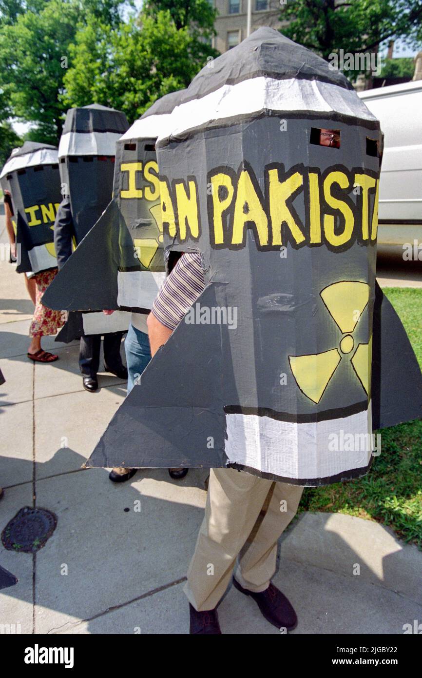 Greenpeace protestors, wearing bomb costumes, rally outside the Embassy of Pakistan, May 28, 1998 in Washington, DC. The protesters called for an end to nuclear arms race which has increased with Pakistan joining nuclear armed nations. Stock Photo