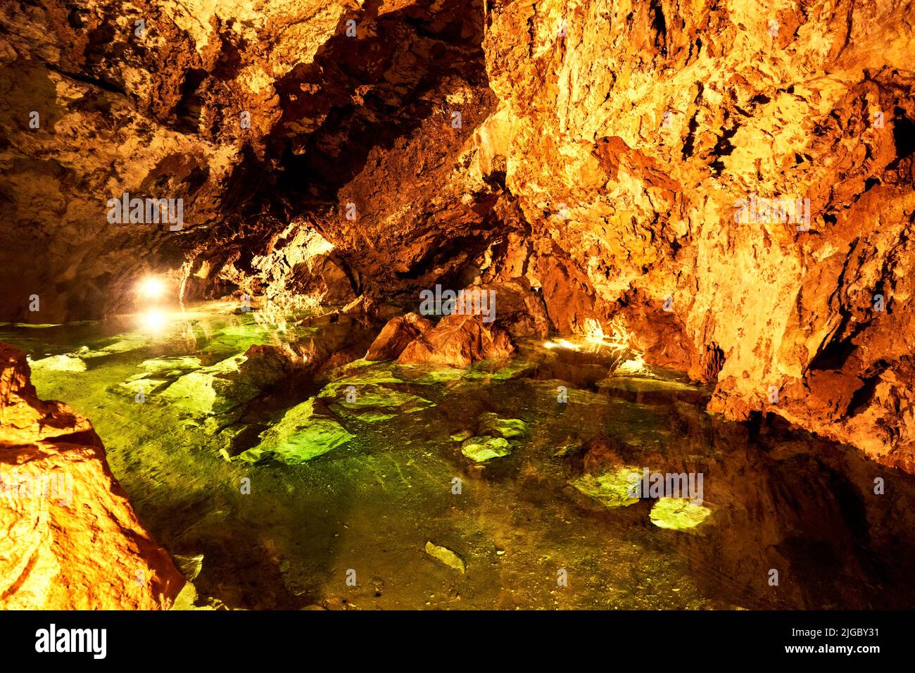 Underground lake in a cave in dolomite rock in the Giant Mountains in the Czech Republic Stock Photo
