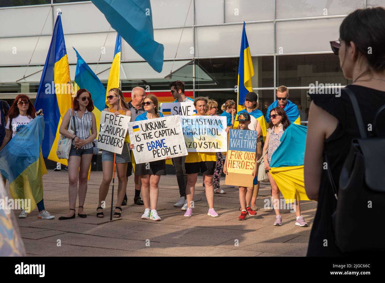 Ukrainians protesting Russian invasion of Ukraine in Mannerheiminaukio, Helsinki, Finland Stock Photo