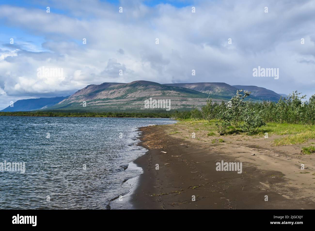 A river on the Putorana plateau. Summer water landscape in the north of Eastern Siberia. Stock Photo