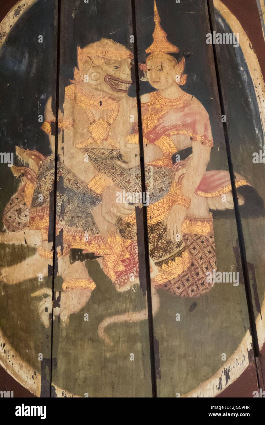 Painting of a mythical beast and a princess on wooden window shutter in the Hall of Bronzes, National Museum, Phnom Penh, Cambodia Stock Photo
