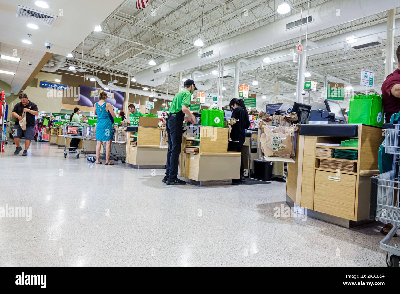Bonita Springs Florida,Publix grocery store supermarket groceries food inside interior,checkout line queue cashiers baggers working workers employees Stock Photo